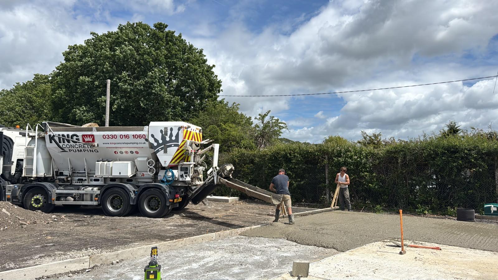 King Concrete Pumping crew placing concrete on a Coulsdon site